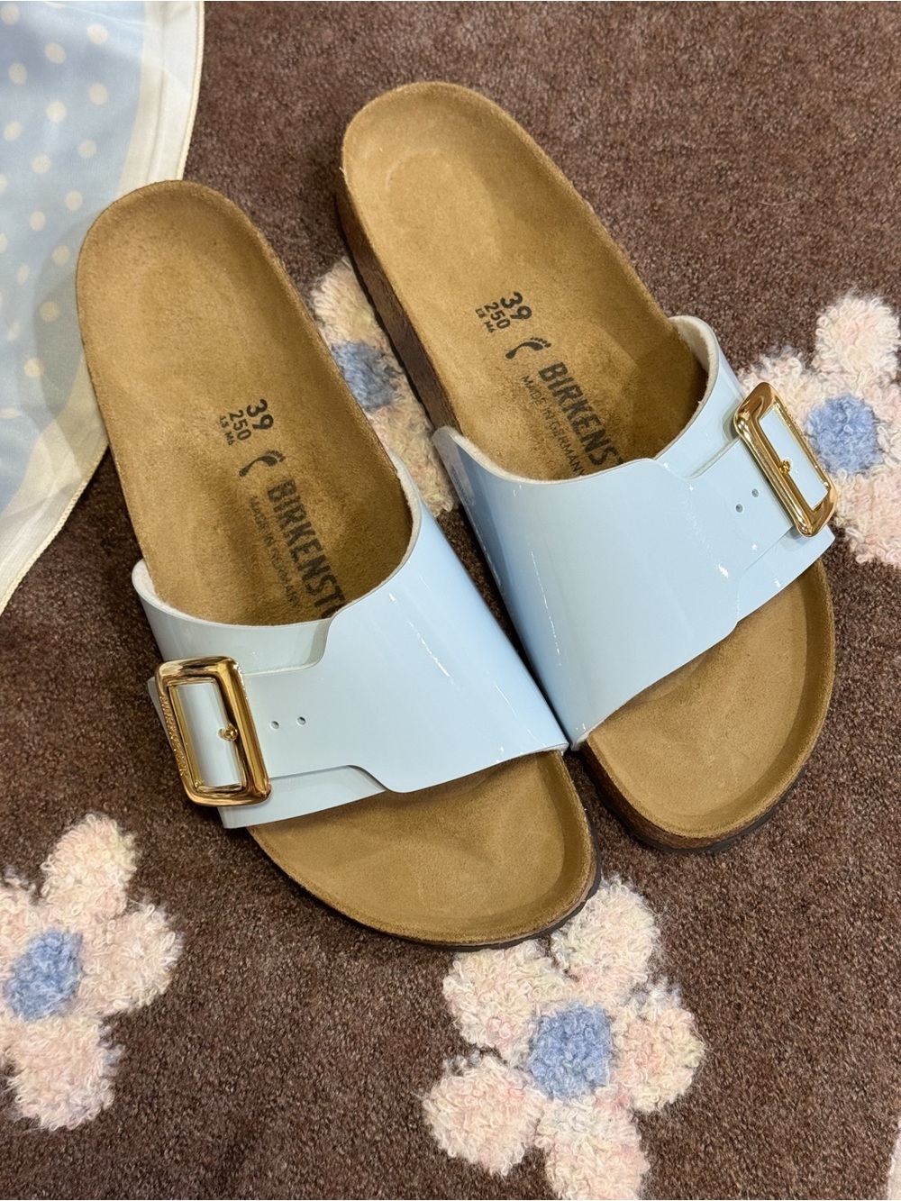 Birkenstock Women’s Catalina Luxe Buckle Sandal 

Patent leather baby blue